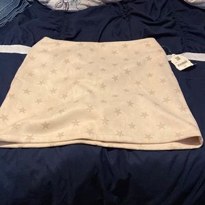 NWT cream colored with stars altered state size l skirt